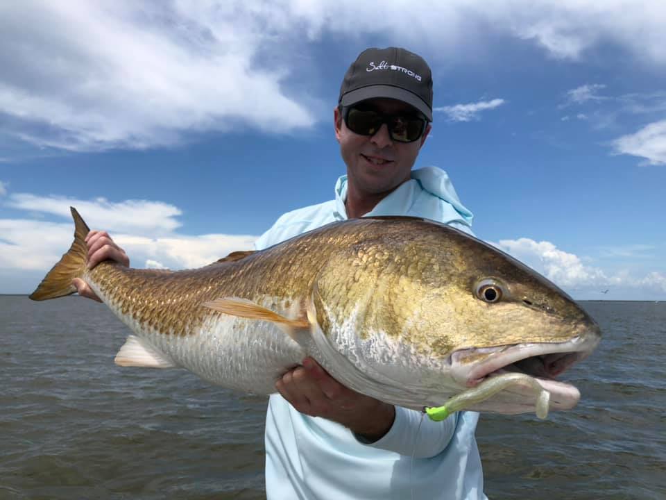 big redfish on popping cork