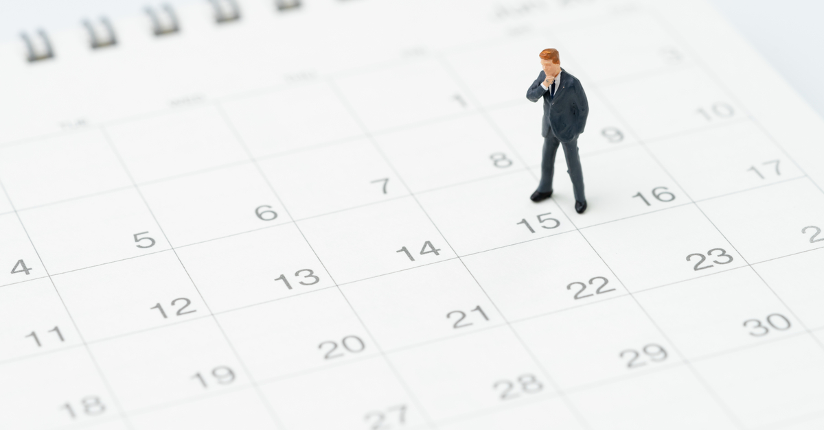 http://man%20looking%20at%20calendar